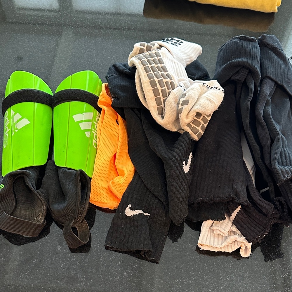 adidas kids small shin guards (no tags) with cut off socks and grip socks